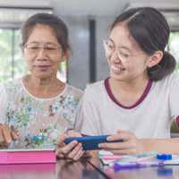Two women studying